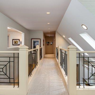 bridge spanning kitchen toward bedrooms